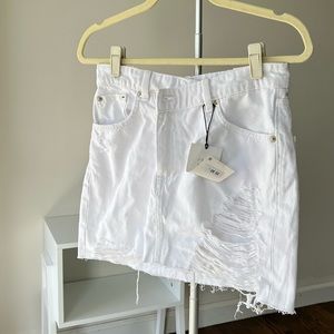 zara white denim high rise skirt with an asymmetrical waist